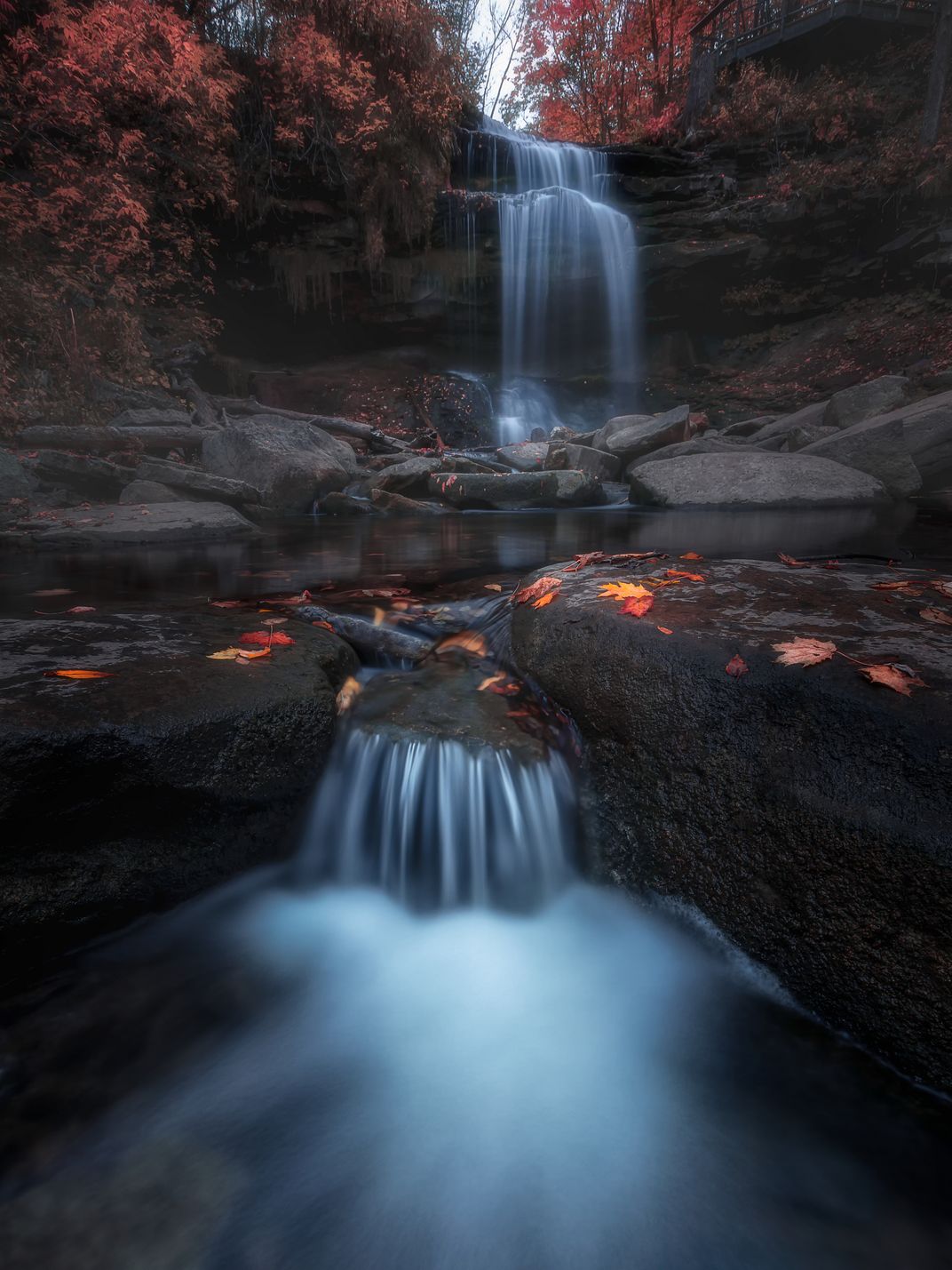 A waterfall surrounded by woods