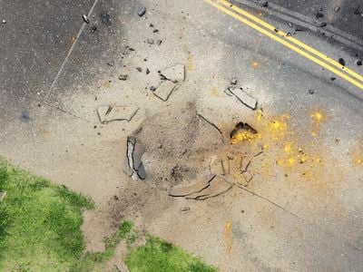 The blast left a large crater in the taxiway at&nbsp;Miyazaki Airport.