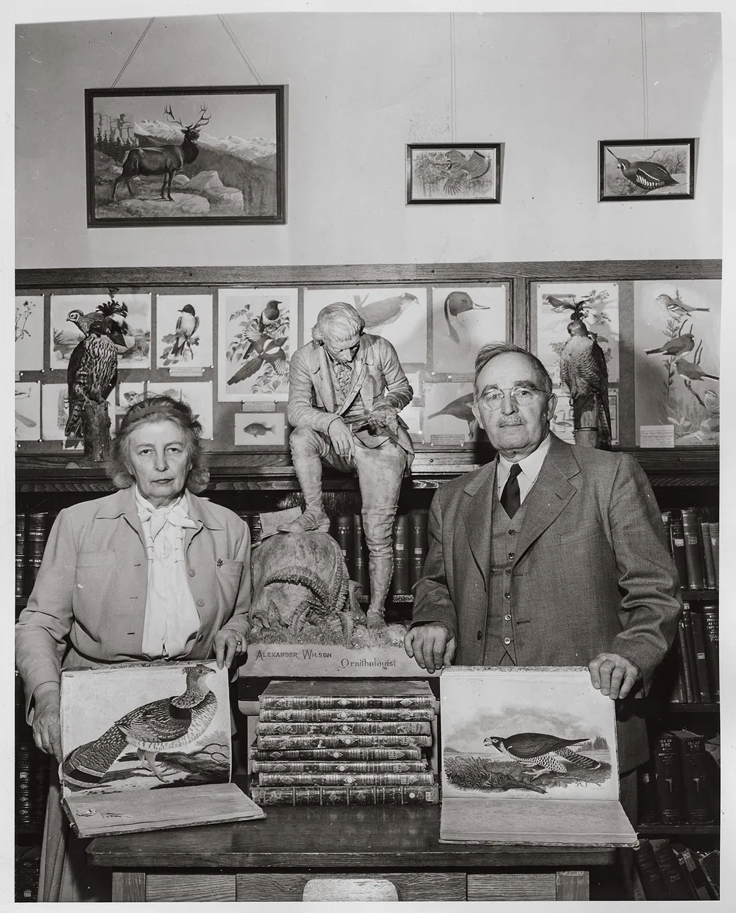 a man and woman pose for a portrait