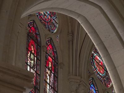 Stained-glass windows inside the Notre-Dame Cathedral in Paris on April 11, 2024

