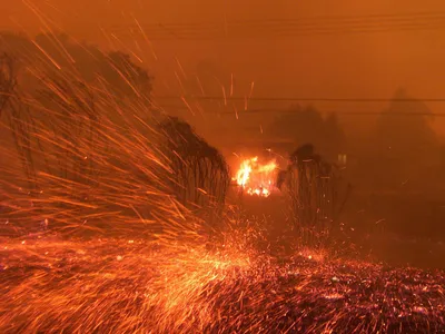 Bush fires rage through Canberra, Australia, on January 18, 2003.