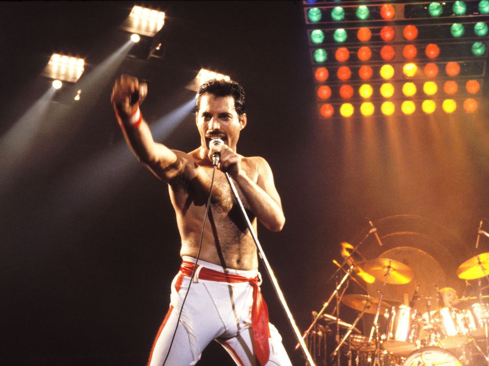 Freddie Mercury performing onstage with Queen in Oakland California, 1982