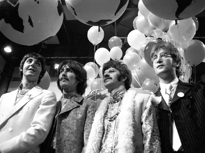 All four Beatles at Abbey Road Studios in London, where they tracked music with the&nbsp;EMI TG12345 console