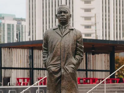 Steadfast Stride Toward Justice by artist&nbsp;Basil Watson is&nbsp;the first life-sized depiction of John Lewis in his home state.