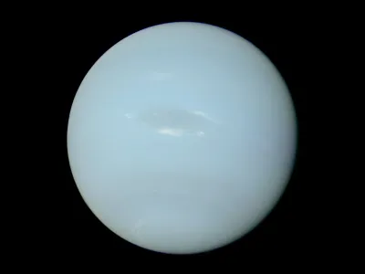 A photo of Neptune, taken by the Voyager 2 probe, with the colors rebalanced to represent its truest appearance