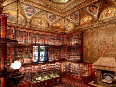 With its exquisitely vaulted ceiling and inlaid walnut bookshelves covering three floors, the East Room was designed as a treasury and showroom for Morgan&#39;s rare book collection.