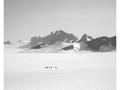 A team skis from the remote Taku D site to the Camp 10 sleeping quarters. Students often travel as much as 8 to 10 miles a day, carrying packs a third of their body weight.