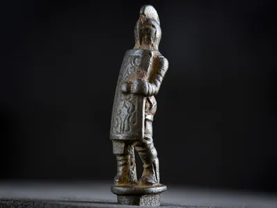 This tiny Roman gladiator figurine used to be the handle on a folding knife.