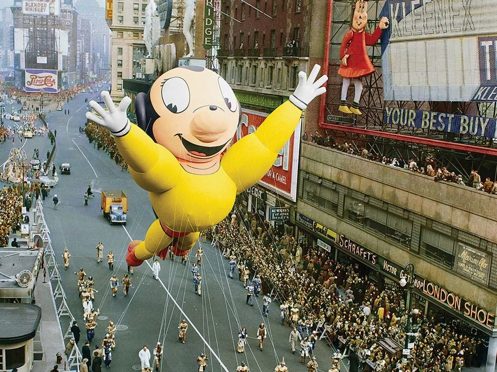 a mighty mouse float in a Thanksgiving Day parade